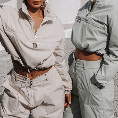 kopen Vrouwen half zip pullover tracksuit met aangepaste etiketten en windbreaker jas online manufacture