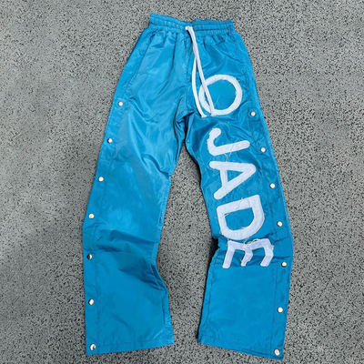 kopen Gepersonaliseerde nylon-sweatpants voor mannen met elastische taille en reflecterende afdruk online manufacture